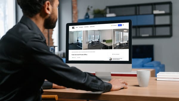 man computer updating hotdesk listing